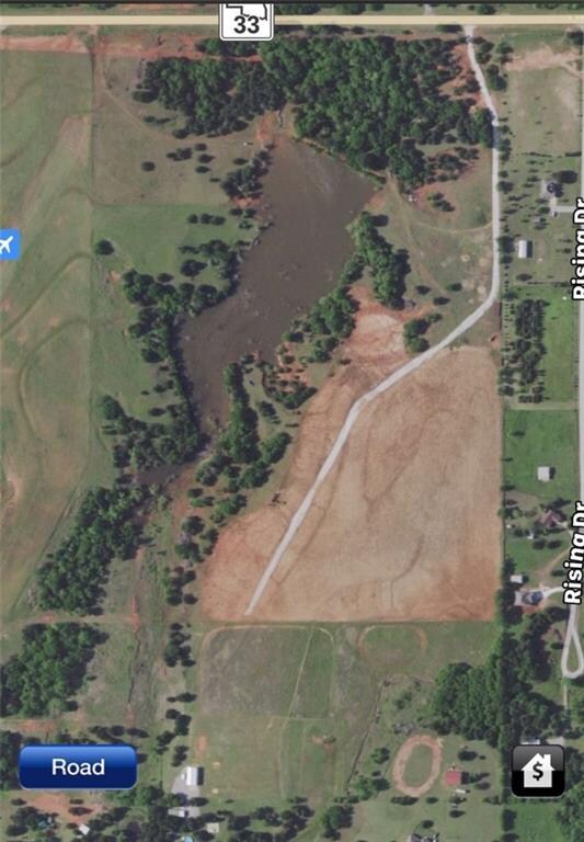 Aerial pic of neighborhood. Shows lake that homeow