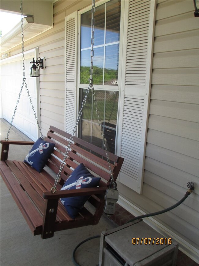 Imagine just swinging on this porch and enjoying t