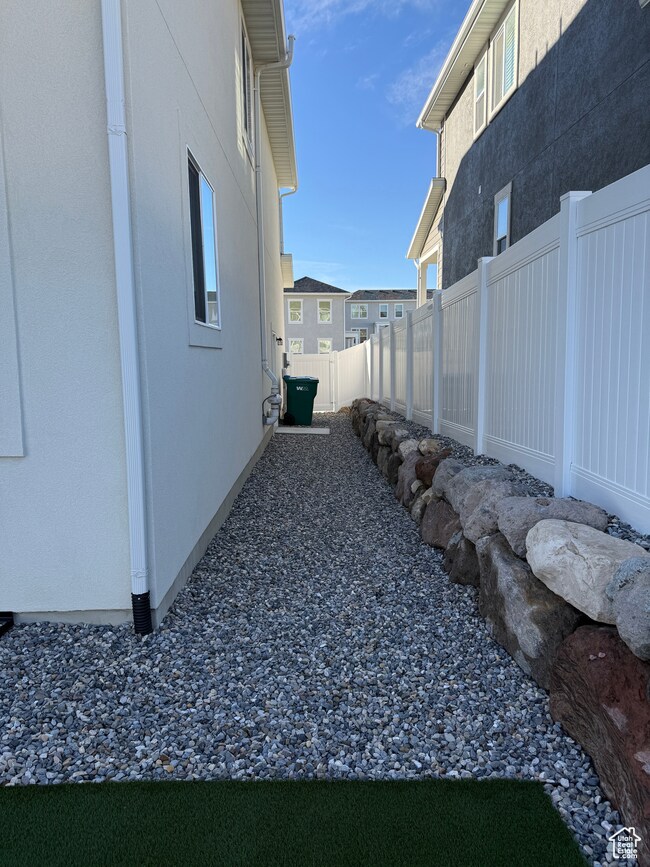 View of fenced backyard