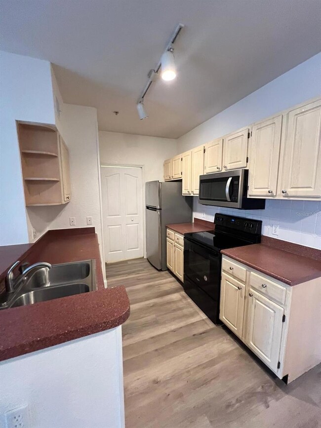 2513 Maitland Crossing Way unit 208, Orlando, FL 32810 - photo 3