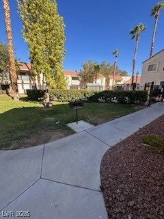 Surrounding community featuring a yard