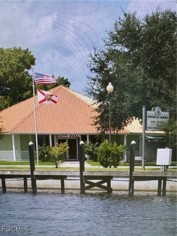 View of home's community with a water view