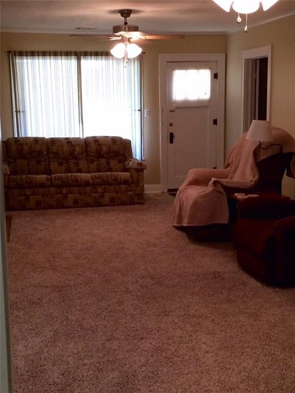 Living viewing from the formal dining area. Two ce