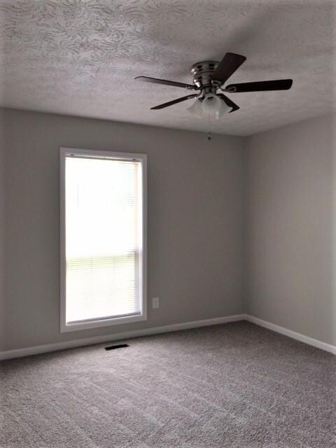 Bedroom with large closet, new carpet
