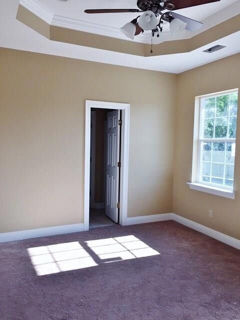 master bedroom has lots of light and high, step ce