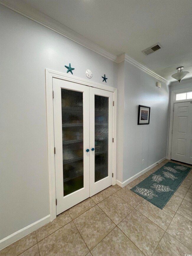 Double Pantry with Rain Glass Doors