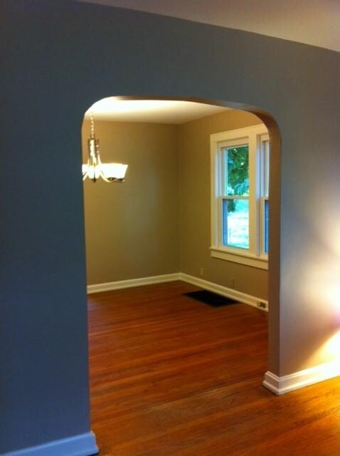 Hardwood floors extend into the dining room.