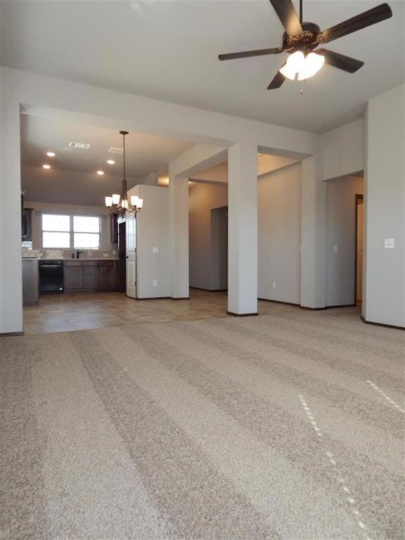 Unfurnished living room with baseboards, light car