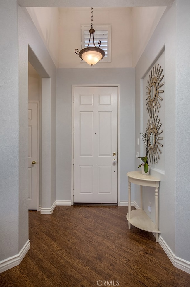entry area with doorway to mini master suite at front of house