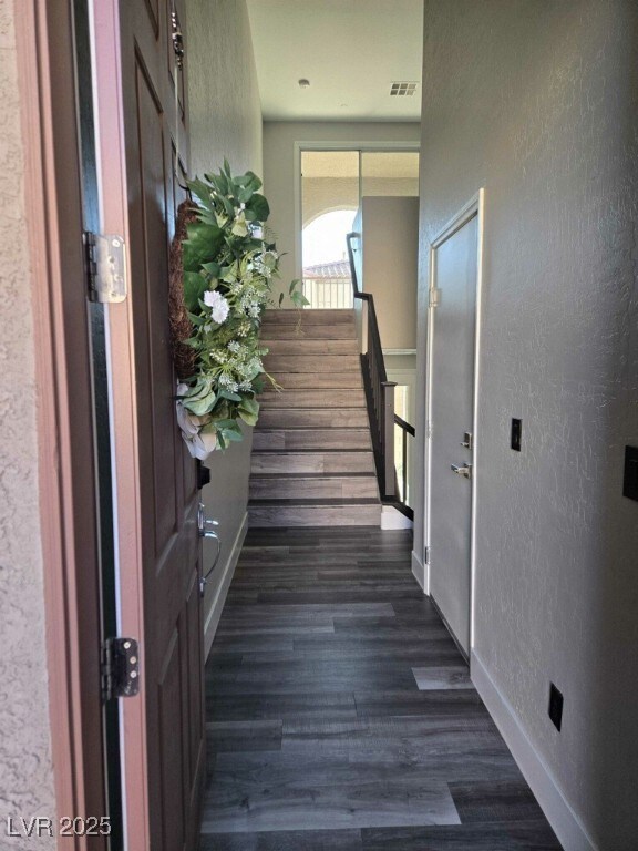 Foyer entrance takes up up to the second level