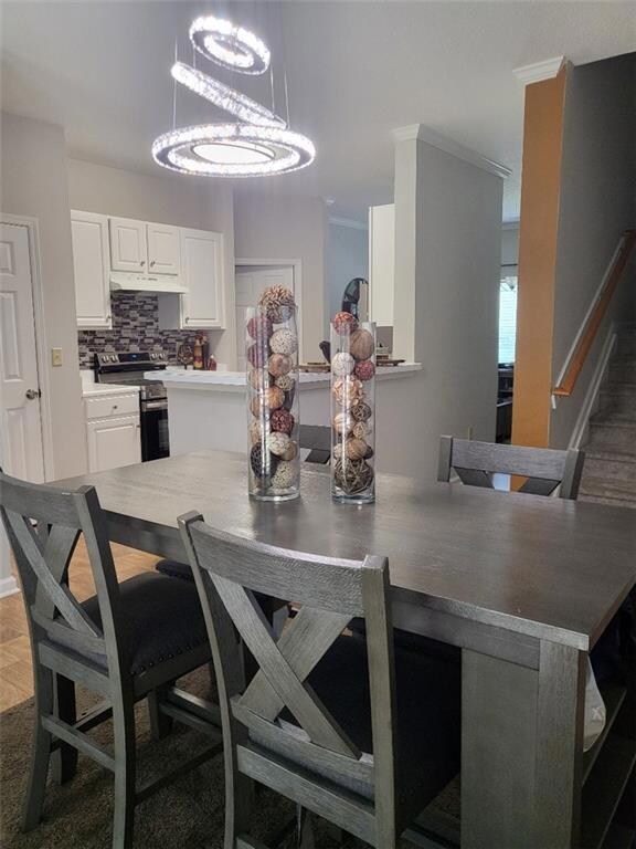 Dining area featuring an inviting chandelier