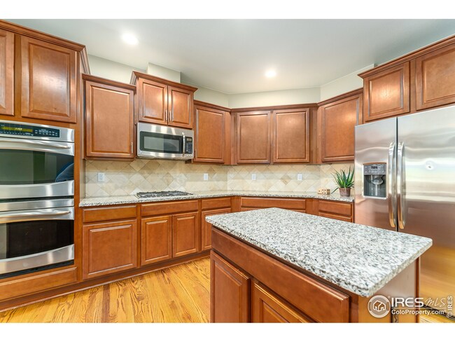 Kitchen with double oven and kitchen island