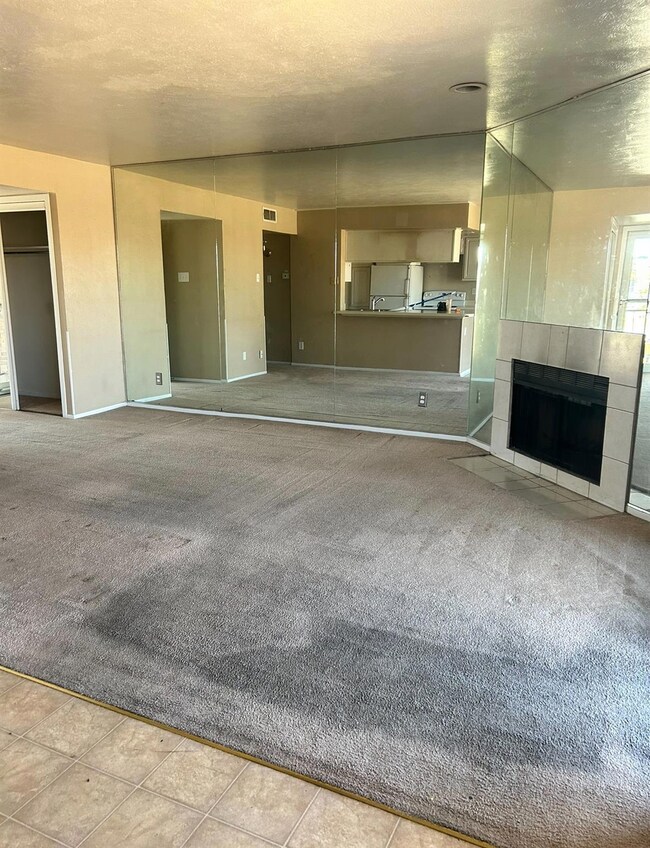 Living room with a fireplace.