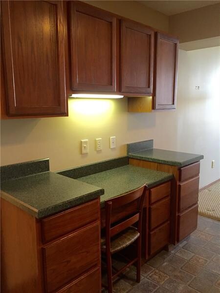 Planning desk with under cabinet lighting.