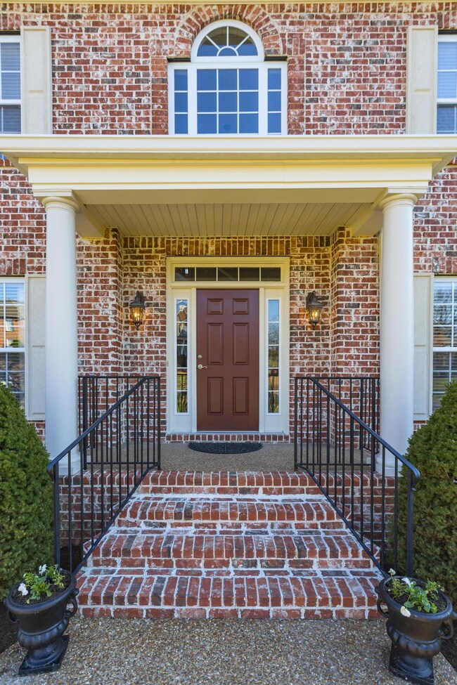 The large covered front porch is accented by beautiful columns. It is a traditional home yet has an open concept. The schools & quiet neighborhood are sought after!