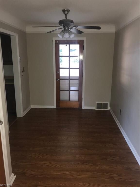 Dining room leads to kitchen and door leads to dec