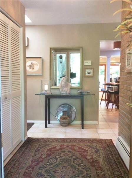 ENTER FROM THE FRONT DOOR TO CERAMIC TILE FLOORING