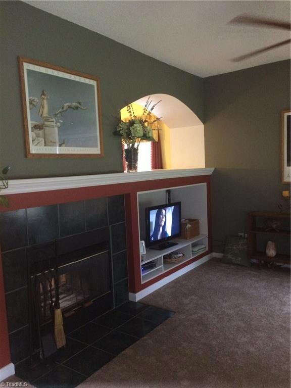 Built-in Entertainment Center and Lovely Archway Feature