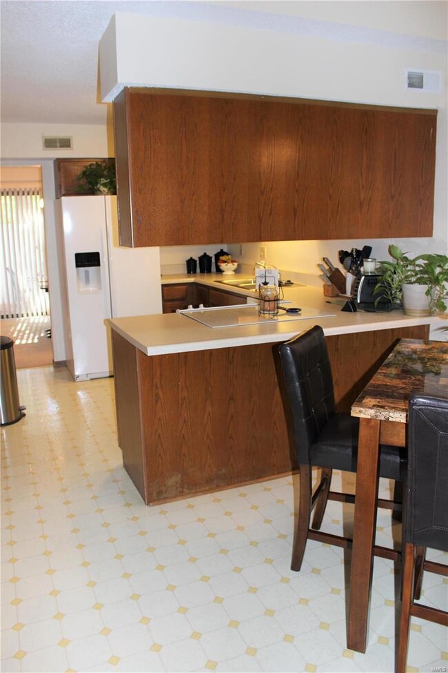 Eat in Kitchen with Large Pantry!