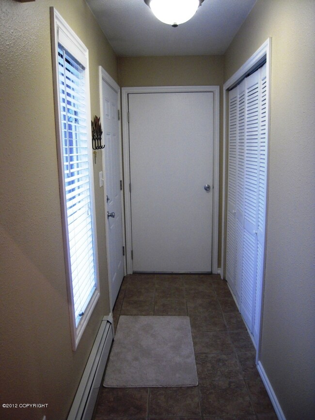 Front Entry on left, dbl closet on rt