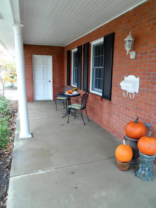 Enjoy the neighborhood from front porch