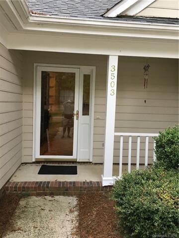 Nice covered front entry if the rain is visiting!