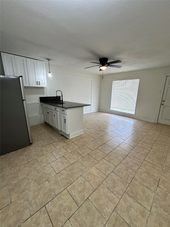 View of living space to kitchen