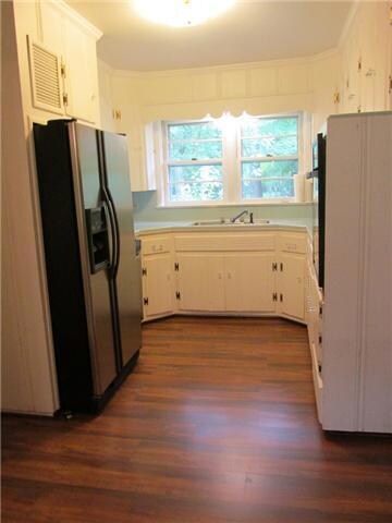 Kitchen with stainless steel appliances. 