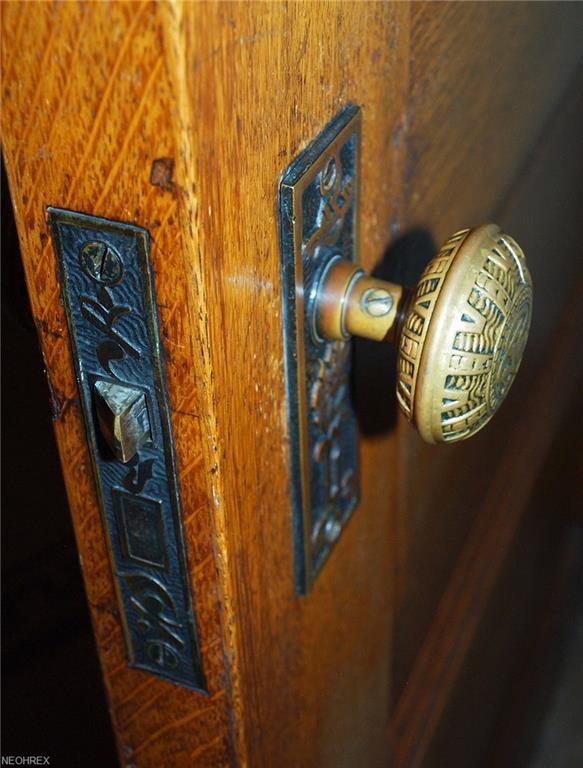 Notice the original embossed door knobs and plates