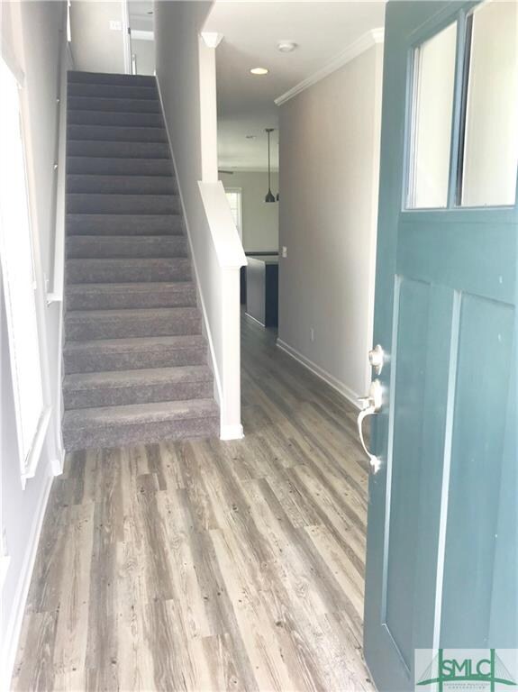 Foyer. Photo taken 6.22.18. Vinyl plank floors, 9'