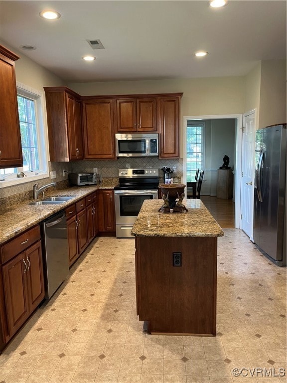 Kitchen with refrigerator, stainless steel electri