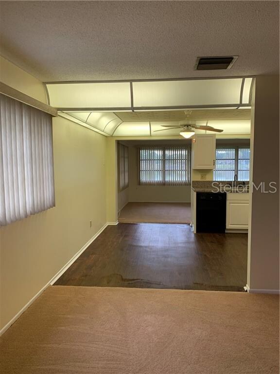 Living room towards kitchen and florida room