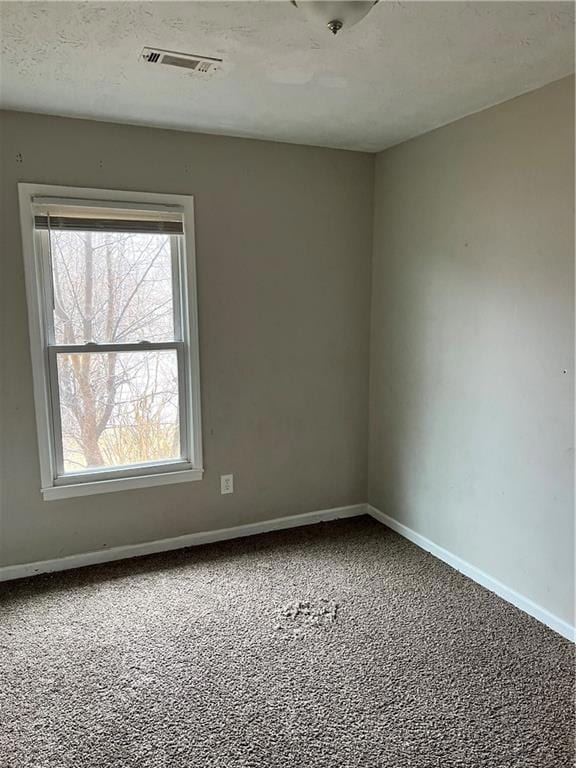 Bedroom 1-Unfurnished room featuring carpet floori