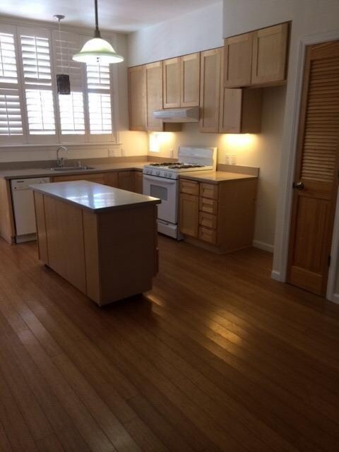 Bamboo flooring in kitchen and eating area. Shutte