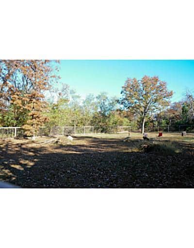 Exterior Back. Nice fenced backyard!