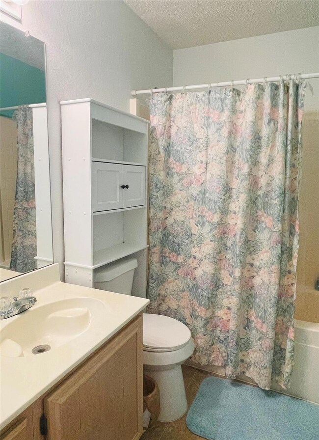 Hall Full bathroom with shower/bathtub combination.