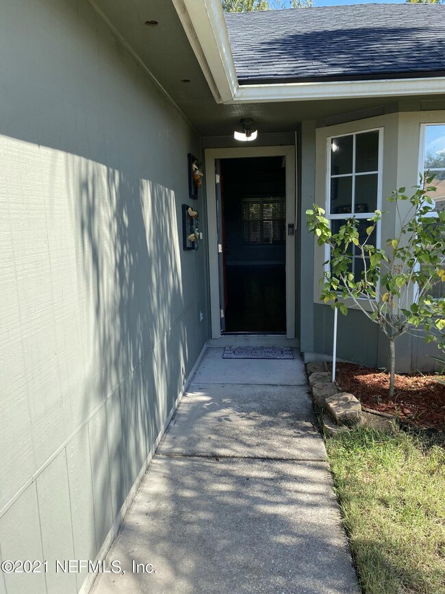 8119 Tessa Terrace E, Jacksonville, FL 32244 - photo 3