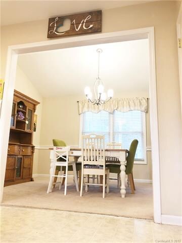 Another Cased Opening Between The Kitchen & Dining