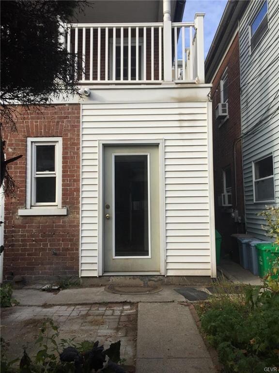 Entrance from garage to mud room with 2nd floor ba
