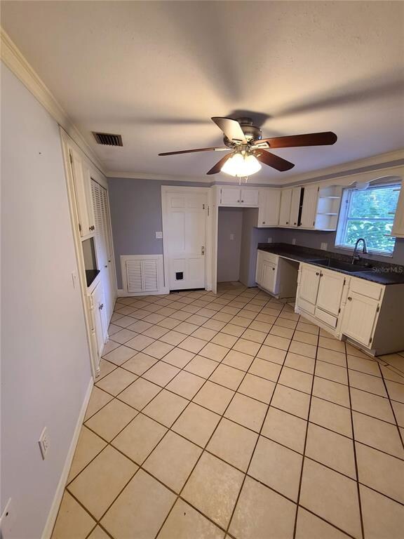 Lots of storage and the white door leads to the ga