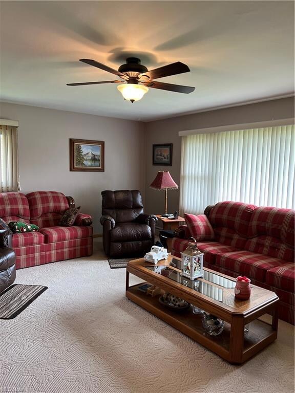 Living room 19 x 15 with ceiling fan.