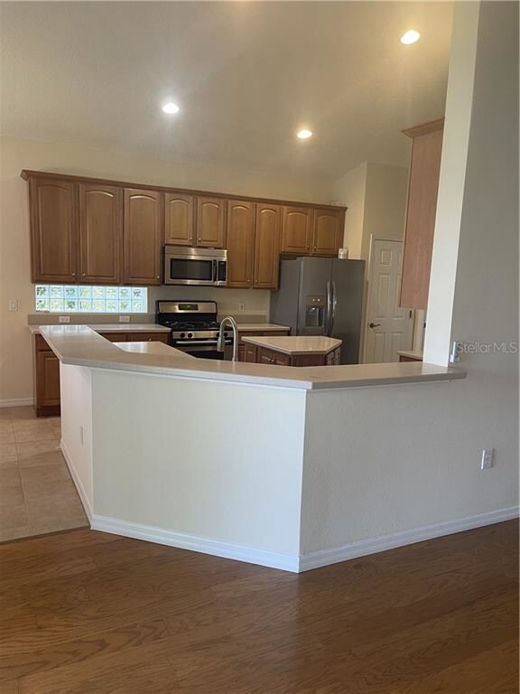 Kitchen Counter open to Family and Breakfast rooms