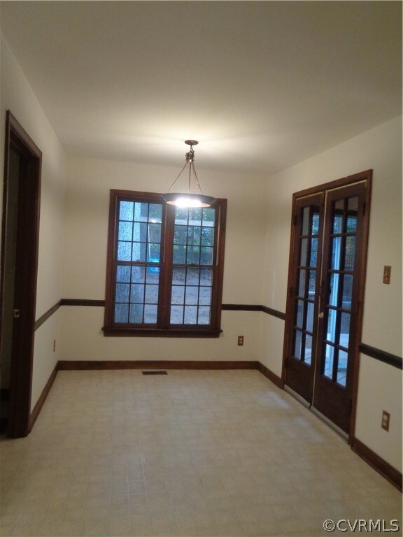 Large eat in kitchen with lots of natural light.