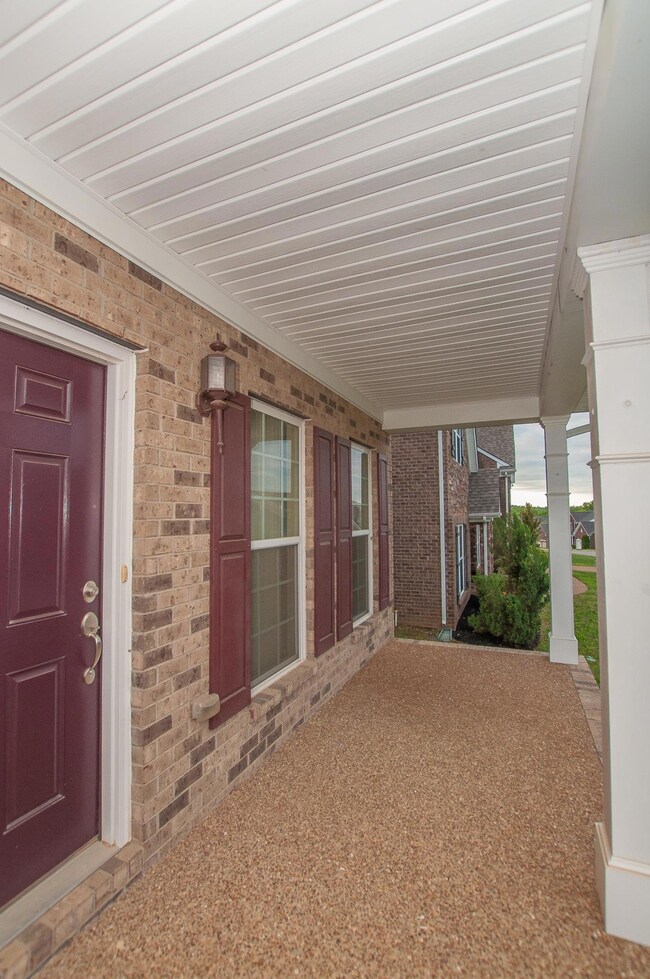 3 sides brick with rocking chair front porch! So much curb appeal!