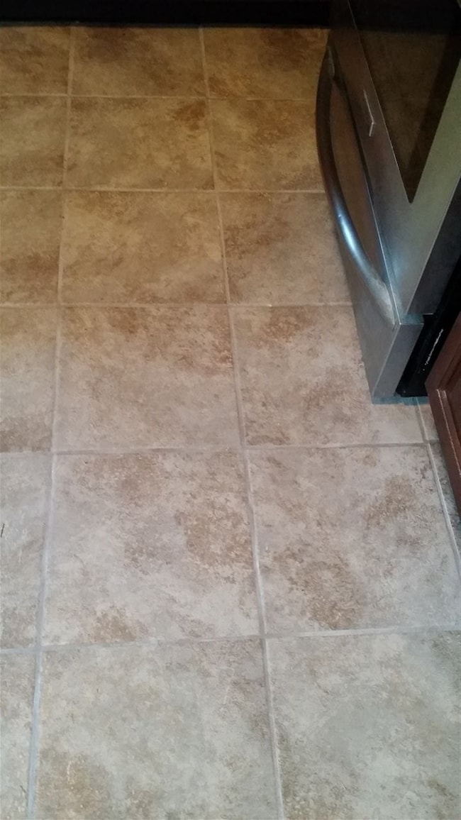 Gorgeous ceramic tile floors in kitchen, dining ar