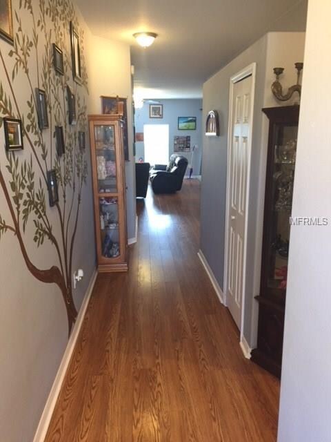 Lovely Foyer with Laminate wood floors through-out