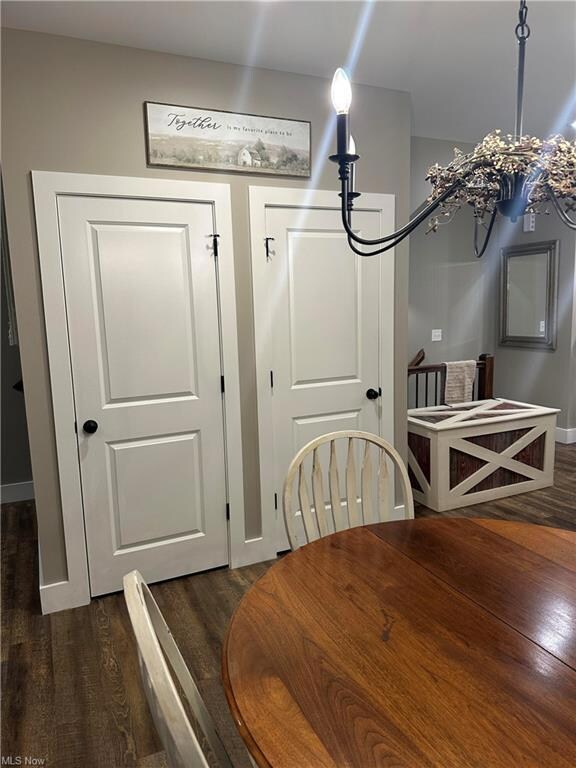 Dining space featuring dark hardwood floors