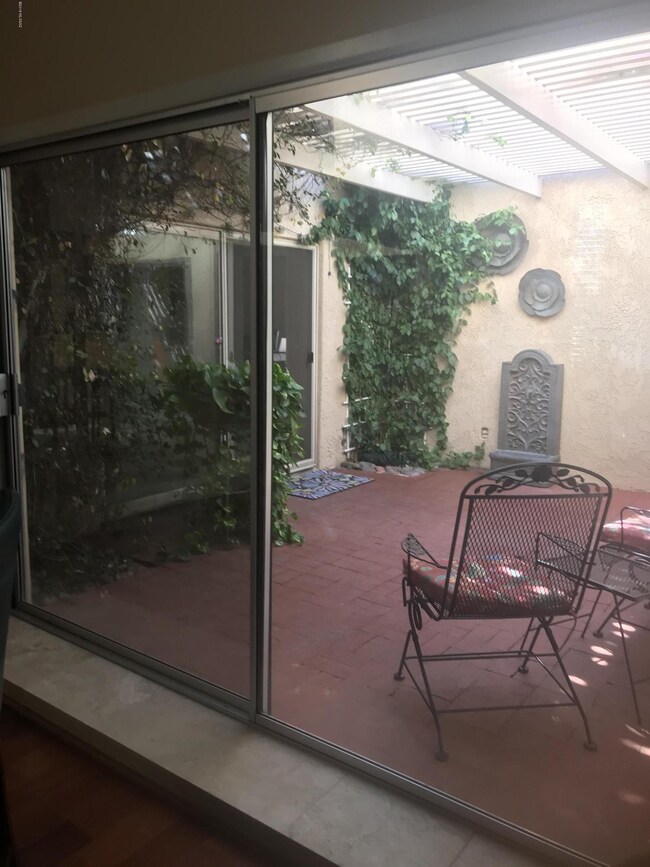 Interior courtyard w/pergola & fountain