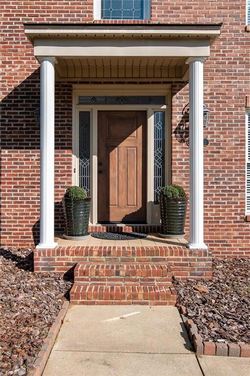 Covered entry with new front door.