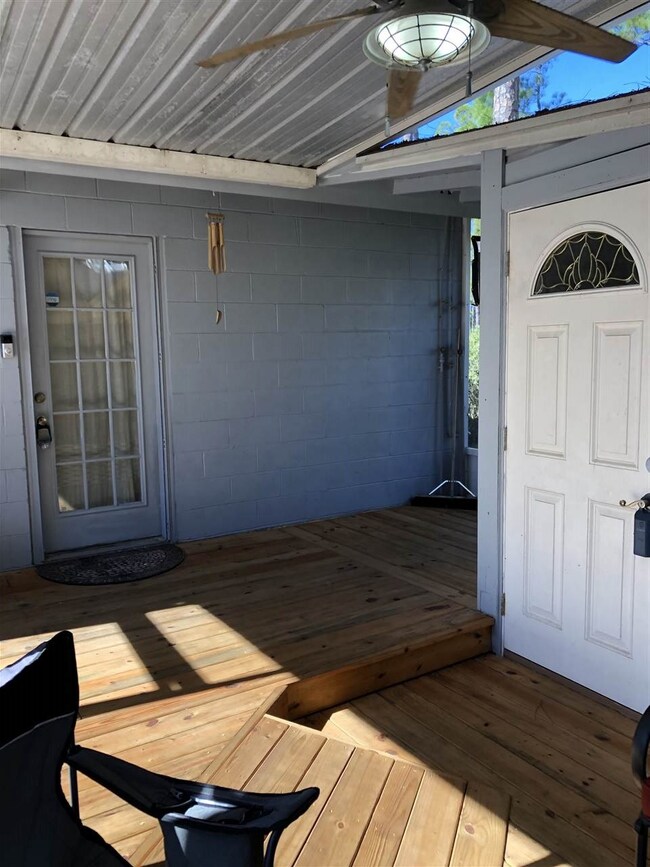 Looking from extra room towards main house and uti